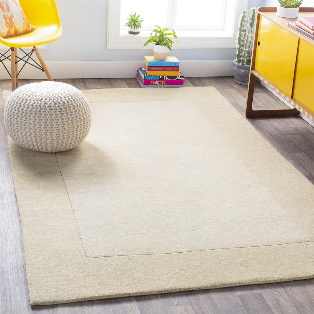 Casa Loom Hand-Tufted Wool Border Rug